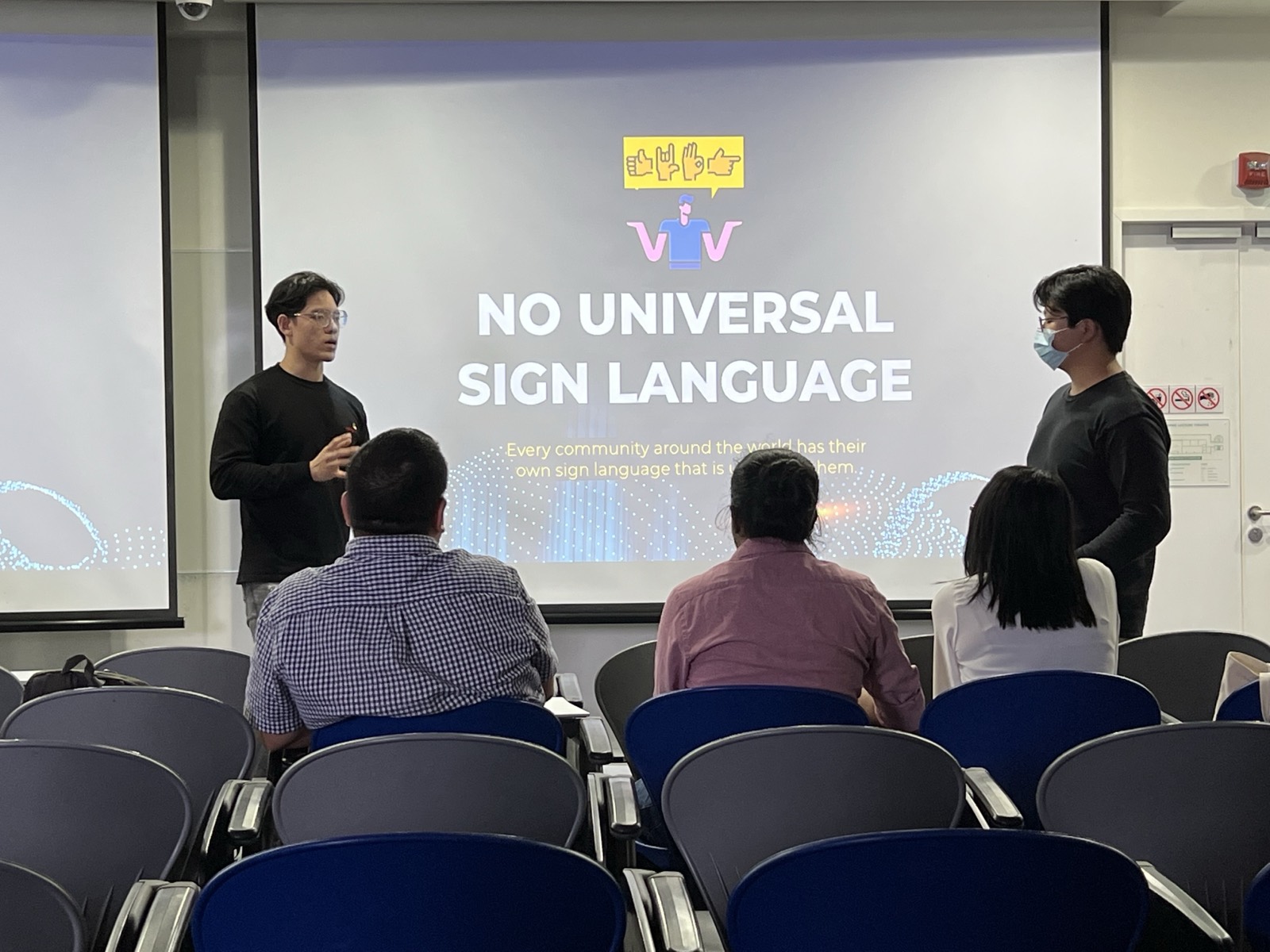 Presenting HearAll's 'No Universal Sign Language' pitch at iNTUition v9.0