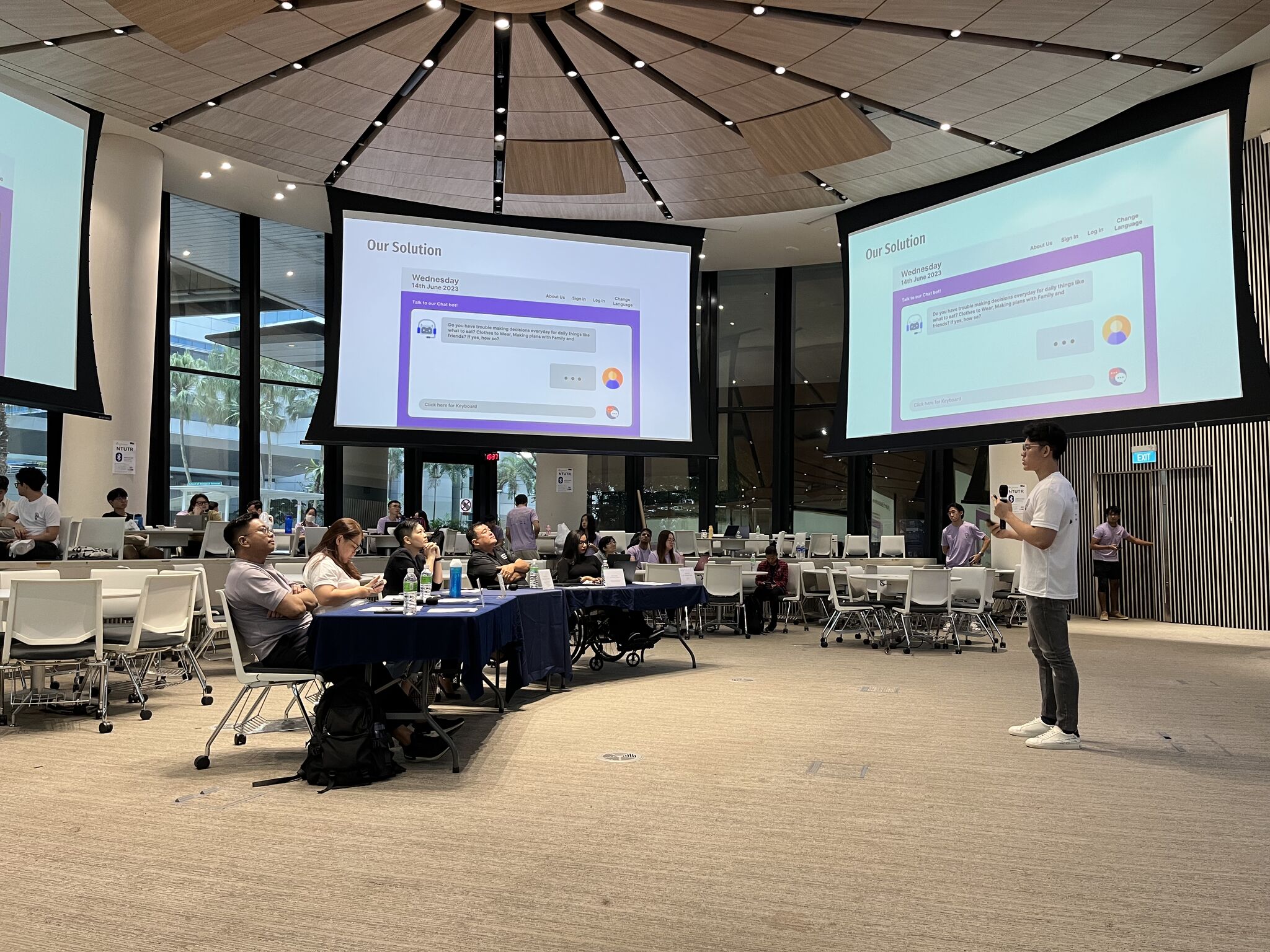 Pitching at ITI 2023, NTUWSC's ideation hackathon on workplace inclusion