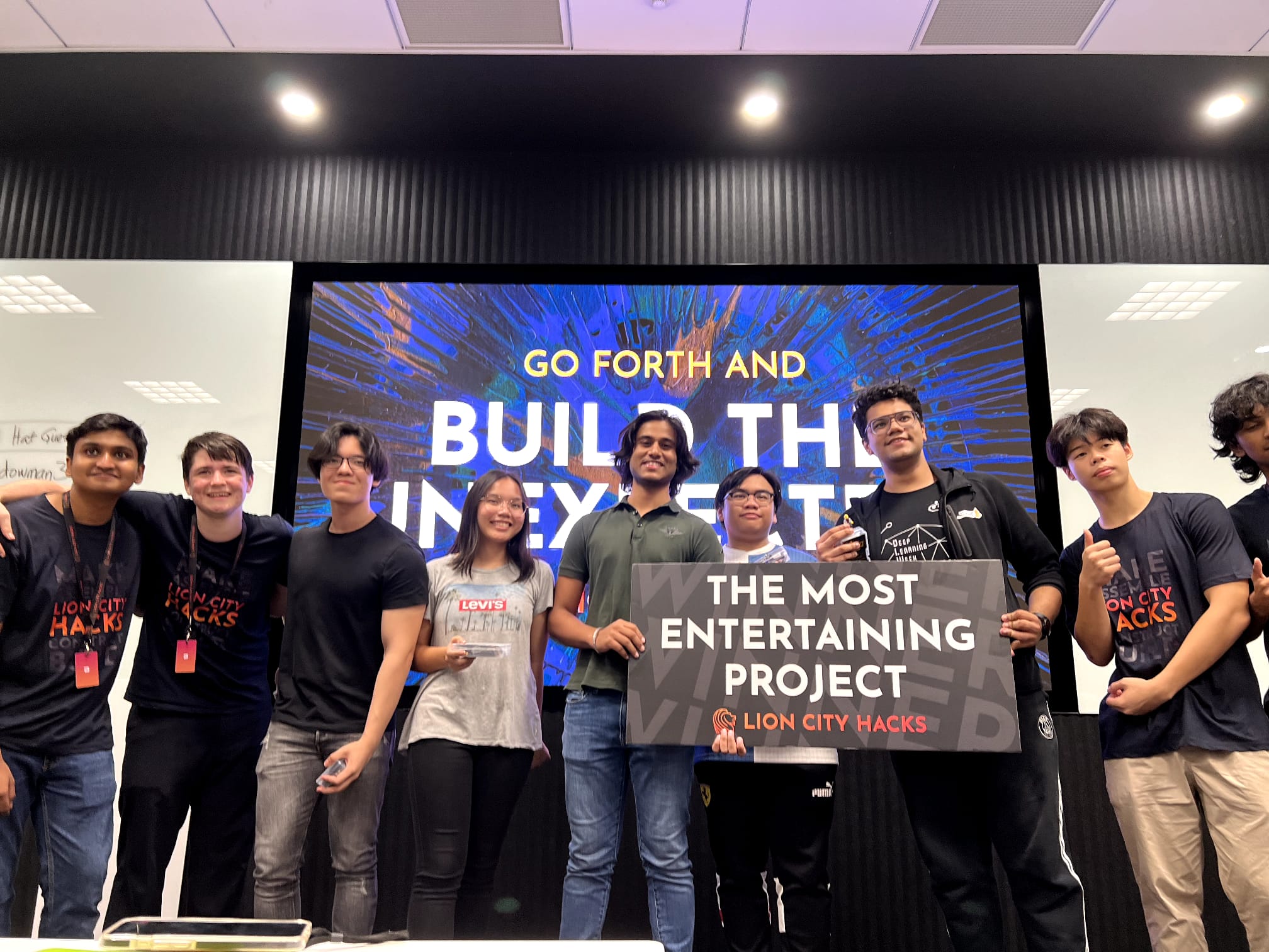 Lion City Hacks venue with the Most Entertaining Project winner board