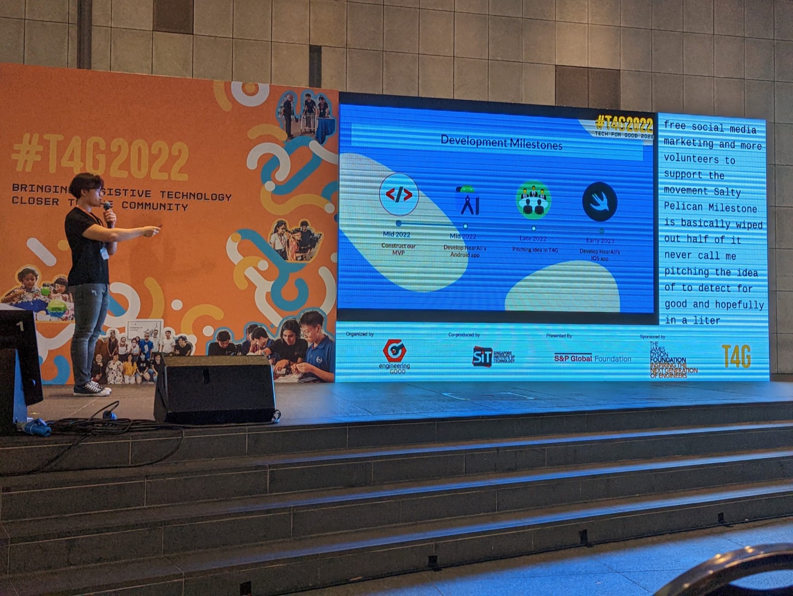 Presenting HearAll on stage at Tech for Good 2022